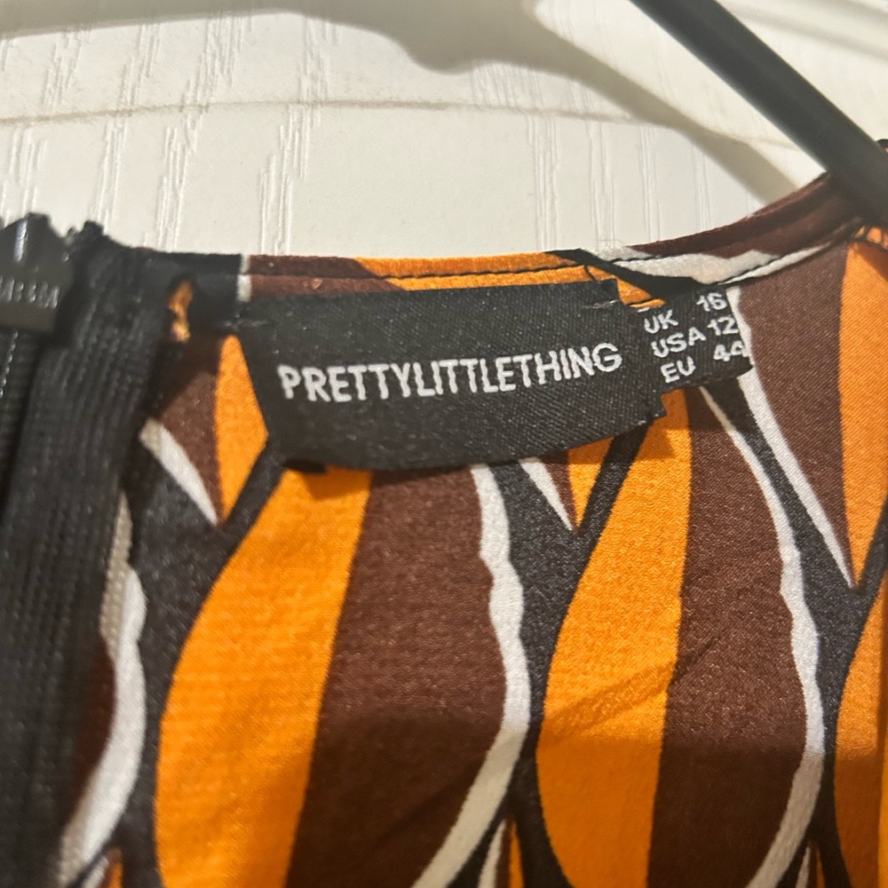 PrettyLittleThing Vibrant Orange and Brown dress